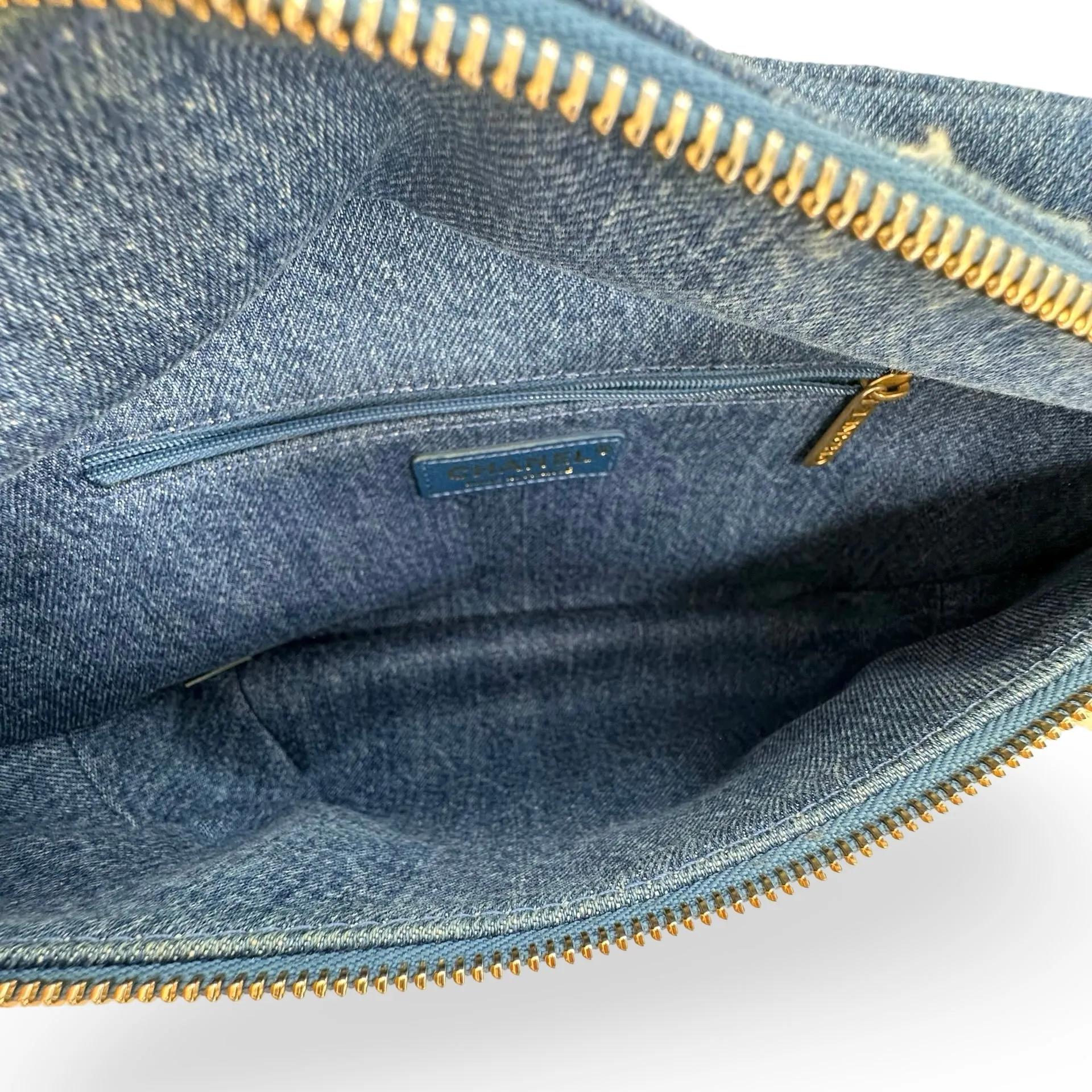 CHANEL: Denim Shearling Egyptian Waist Bag
