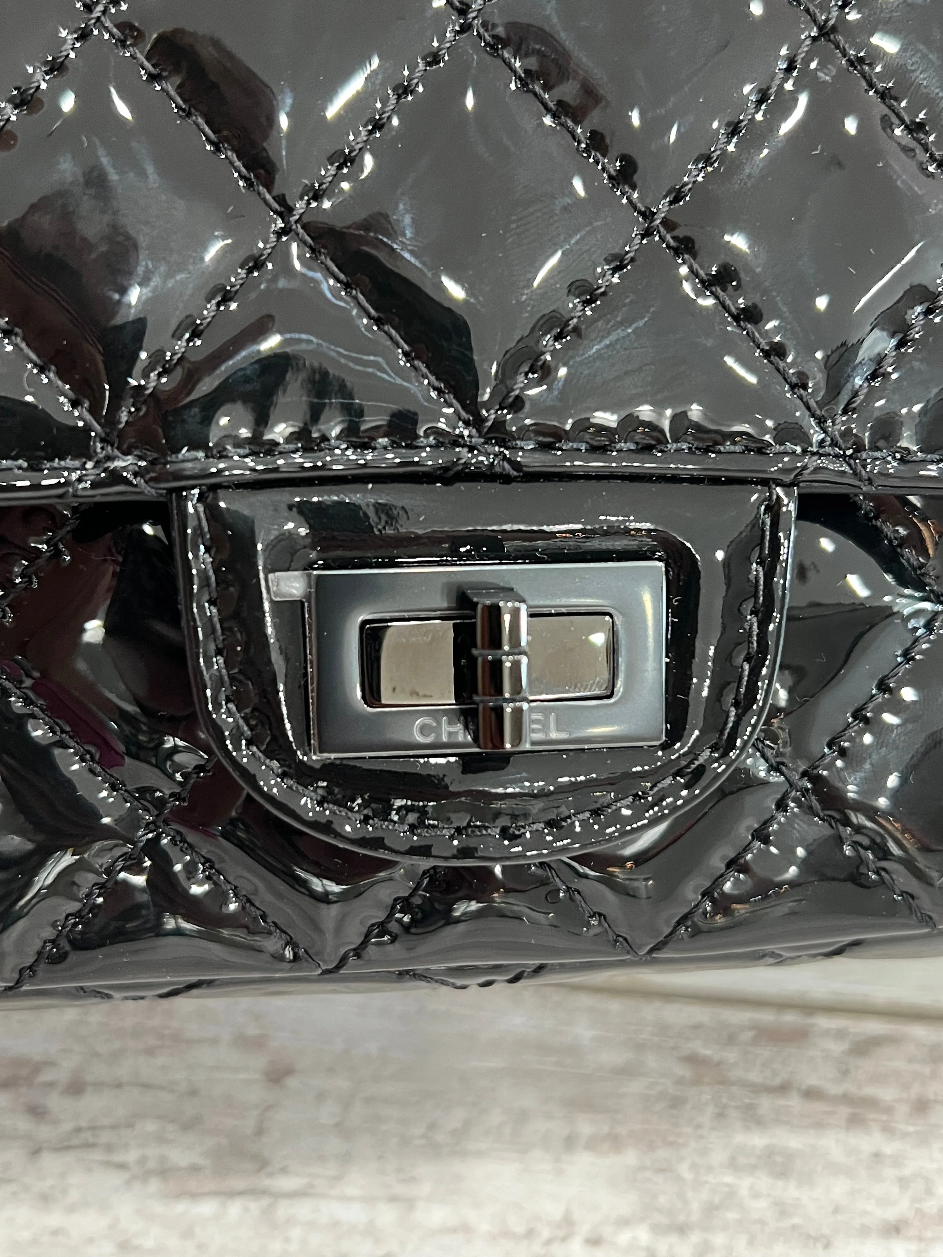 CHANEL QUILTED PATENT LEATHER REISSUE SO BLACK MINI FLAP BAG
