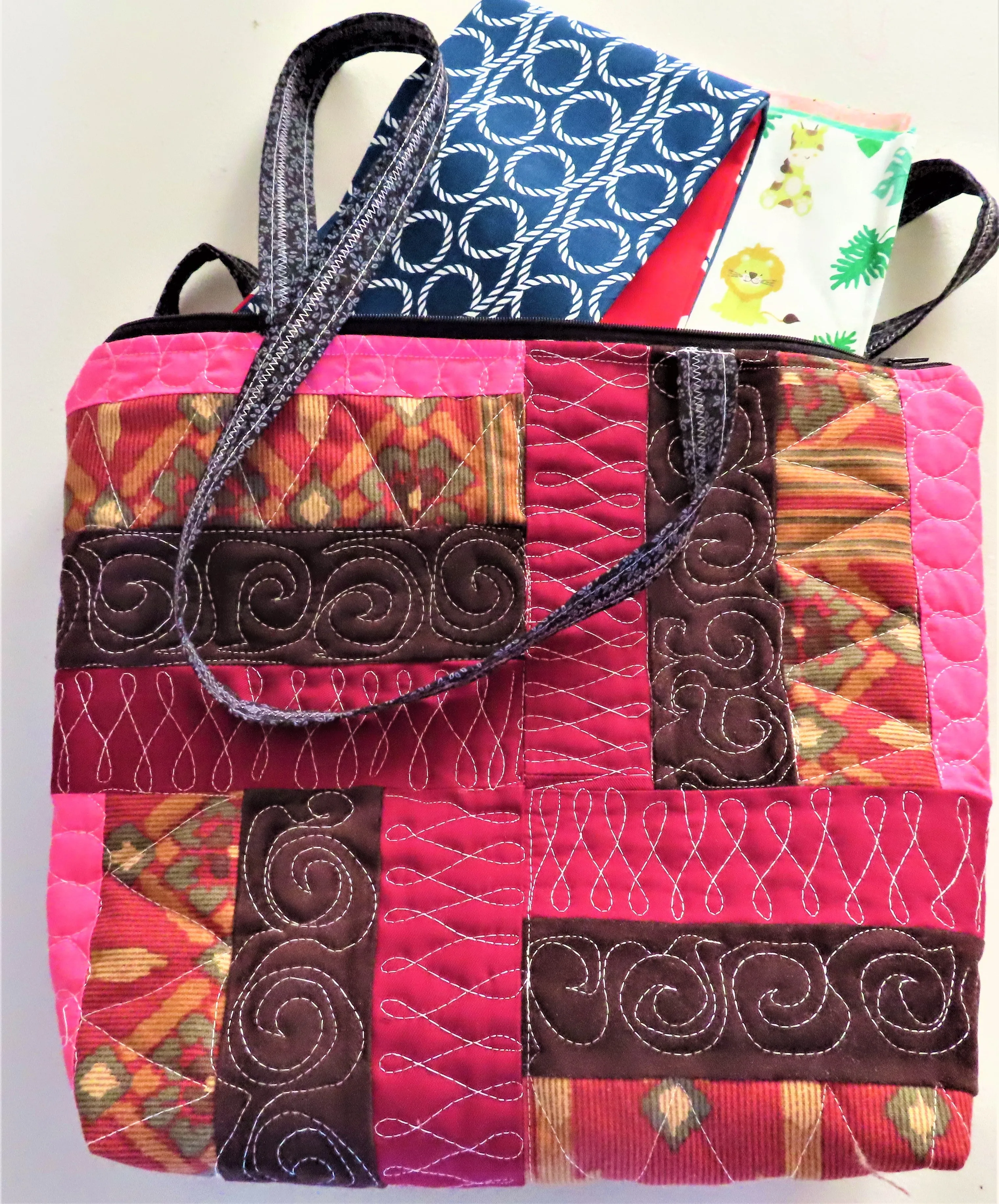 Handmade Jelly Roll quilted zipper tote bag