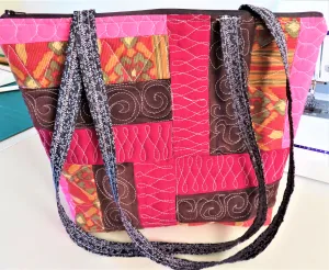 Handmade Jelly Roll quilted zipper tote bag