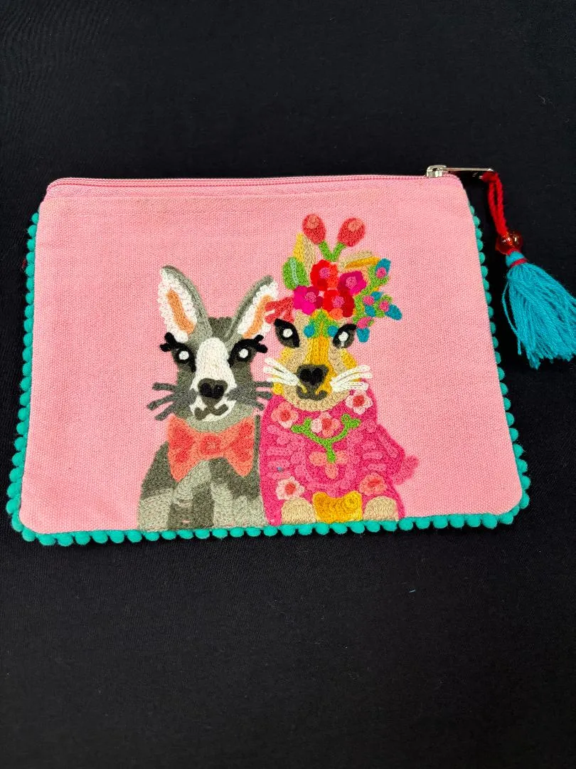 Karma Living Pouches and Clutches