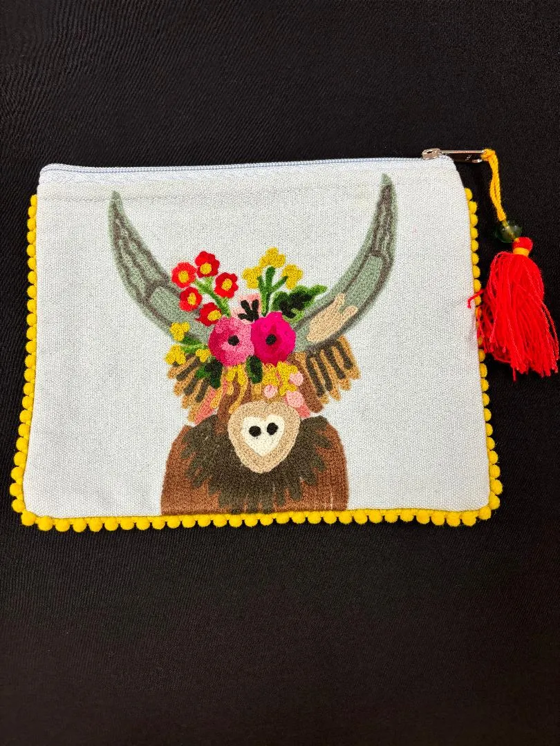 Karma Living Pouches and Clutches