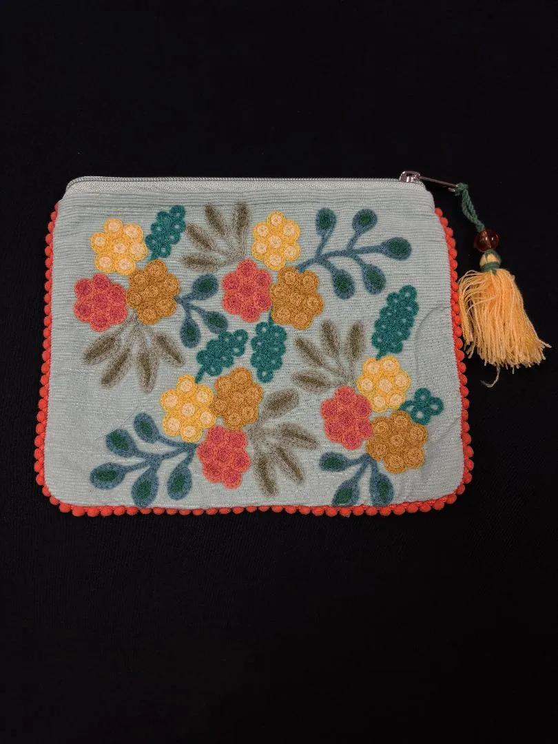 Karma Living Pouches and Clutches