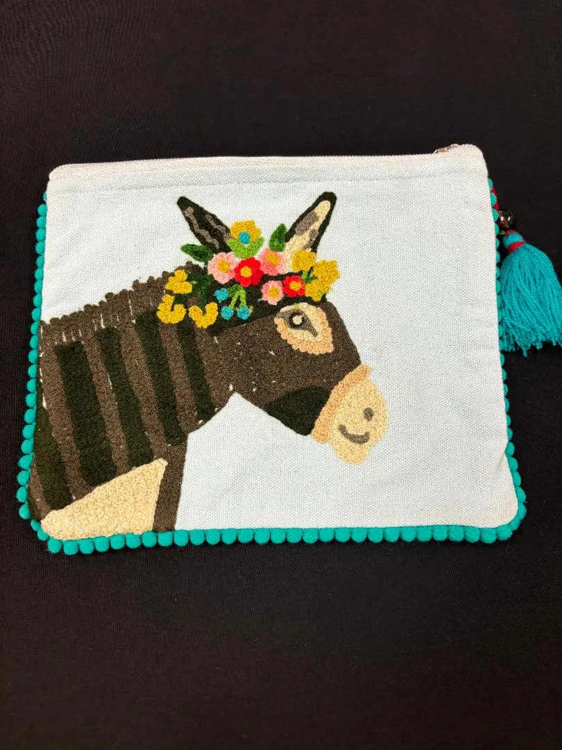 Karma Living Pouches and Clutches