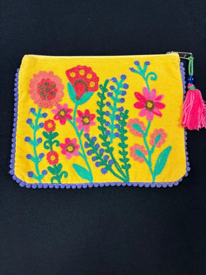 Karma Living Pouches and Clutches
